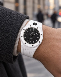 Royal Pop Ocho Negro on the wrist with its white premium rubber strap
