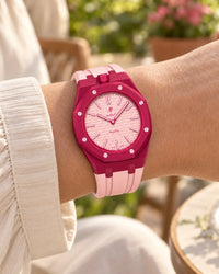 Royal Pop Otto Rosso on the wrist with its pink and red premium rubber strap
