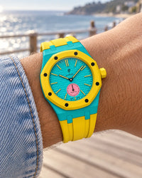 Royal Pop Otg Roz on the wrist with its turquoise and yellow premium rubber strap