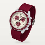 Burgundy nylon strap for Omega x Swatch MoonSwatch Mission to Pluto, fitted on the watch