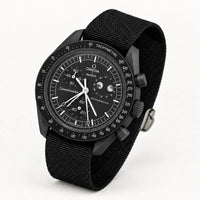 Plain black fabric strap on MoonSwatch Moonphase New Moon