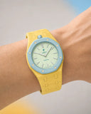 Yellow link strap for the Royal Pop Blaue Acht worn on the wrist