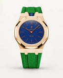 Cinturino effetto tessuto verde per AP x Swatch Royal Pop Orenji Hachi, cassa oro rosa (corona a ore 12)