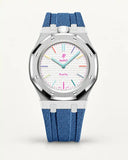 Cinturino effetto tessuto blu grigio per AP x Swatch Royal Pop Huit Blanc, cassa argento (corona a ore 12)