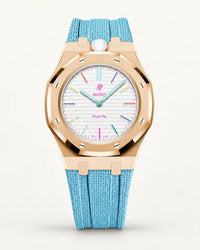 Cinturino effetto tessuto azzurro per AP x Swatch Royal Pop Huit Blanc, cassa oro rosa (corona a ore 12)