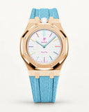 Cinturino effetto tessuto azzurro per AP x Swatch Royal Pop Huit Blanc, cassa oro rosa (corona a ore 12)