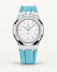 Cinturino effetto tessuto azzurro per AP x Swatch Royal Pop Huit Blanc, cassa argento (corona a ore 12)