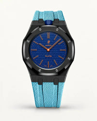 Cinturino effetto tessuto azzurro per AP x Swatch Royal Pop Orenji Hachi, cassa nera (corona a ore 12)