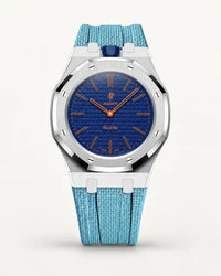Cinturino effetto tessuto azzurro per AP x Swatch Royal Pop Orenji Hachi, cassa argento (corona a ore 12)