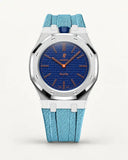Cinturino effetto tessuto azzurro per AP x Swatch Royal Pop Orenji Hachi, cassa argento (corona a ore 12)
