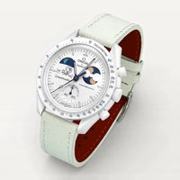 White leather strap on MoonSwatch Earthphase Moonshine Gold Cold Moon