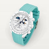 Cyan premium rubber strap with white stitching on MoonSwatch Earthphase Moonshine Gold Cold Moon