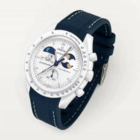 Navy blue premium rubber strap with white stitching on MoonSwatch Earthphase Moonshine Gold Cold Moon