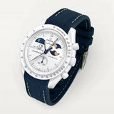 Navy blue premium rubber strap with white stitching on MoonSwatch Earthphase Moonshine Gold Cold Moon