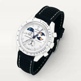 Black perforated premium rubber strap with white stitching on MoonSwatch Earthphase Moonshine Gold Cold Moon