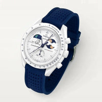 Navy blue perforated premium rubber strap on MoonSwatch Earthphase Moonshine Gold Cold Moon