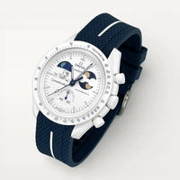 Navy blue premium rubber strap with white contrast band on MoonSwatch Earthphase Moonshine Gold Cold Moon