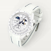 White premium rubber strap with blue stitching on MoonSwatch Earthphase Moonshine Gold Cold Moon