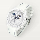 White premium rubber strap with blue stitching on MoonSwatch Earthphase Moonshine Gold Cold Moon