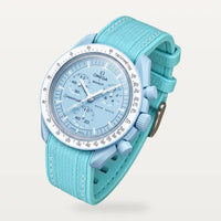 Cyan premium rubber strap with white stitching on MoonSwatch Mission to Uranus