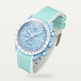 Light blue and white two-tone premium rubber strap on MoonSwatch Mission to Uranus