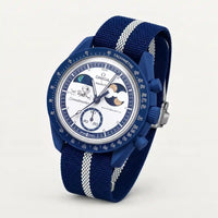 Navy blue premium canvas strap with white stripes on MoonSwatch Earthphase Moonshine Gold
