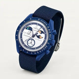 Navy blue premium canvas strap on MoonSwatch Earthphase Moonshine Gold
