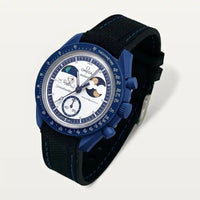 Black premium rubber strap with blue stitching on MoonSwatch Earthphase Moonshine Gold