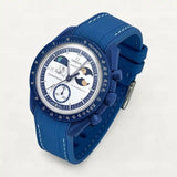 Blue premium rubber strap with white stitching on MoonSwatch Earthphase Moonshine Gold