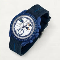 Navy blue premium rubber strap with blue contrast band on MoonSwatch Earthphase Moonshine Gold