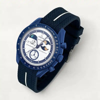 Navy blue premium rubber strap with white contrast band on MoonSwatch Earthphase Moonshine Gold