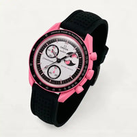 Black perforated premium rubber strap on MoonSwatch Pink Moonphase
