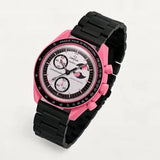 Black steel link bracelet on MoonSwatch Pink Moonphase