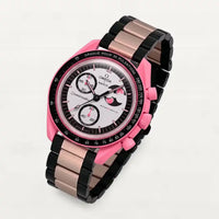 Pink and black steel link bracelet on MoonSwatch Pink Moonphase