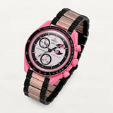Pink and black steel link bracelet on MoonSwatch Pink Moonphase