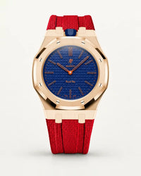 Cinturino effetto tessuto rosso per AP x Swatch Royal Pop Orenji Hachi, cassa oro rosa (corona a ore 12)