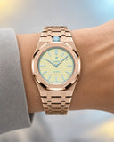 Royal Pop Blaue Acht worn on the wrist with the WatchCollab gold steel integrated bracelet
