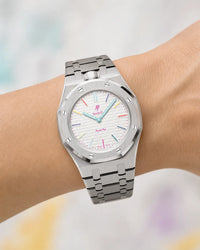 Royal Pop Huit Blanc worn on the wrist with the WatchCollab silver steel integrated bracelet
