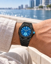 Black steel strap worn on the wrist with the AP x Swatch Royal Pop Làn Ba