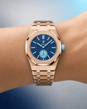 Royal Pop Làn Ba worn on the wrist with the WatchCollab gold steel integrated bracelet