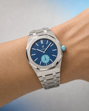 Royal Pop Làn Ba worn on the wrist with the WatchCollab silver steel integrated bracelet