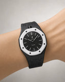 Black link strap for the AP x Swatch Royal Pop Ocho Negro worn on the wrist | WatchCollab