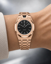 Royal Pop Ocho Negro worn on the wrist with the WatchCollab gold steel integrated bracelet