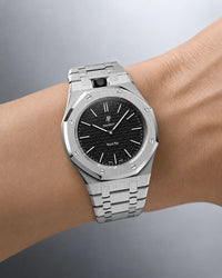 Royal Pop Ocho Negro worn on the wrist with the WatchCollab silver steel integrated bracelet