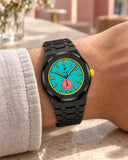 Black steel strap worn on the wrist with the AP x Swatch Royal Pop Otg Roz