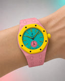 Pink link strap for the Royal Pop Otg Roz worn on the wrist