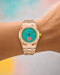 Royal Pop Otg Roz worn on the wrist with the WatchCollab gold steel integrated bracelet
