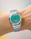 Royal Pop Otg Roz worn on the wrist with the WatchCollab silver steel integrated bracelet