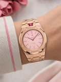Royal Pop Otto Rosso worn on the wrist with the WatchCollab gold steel integrated bracelet