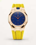 Cinturino effetto tessuto giallo per AP x Swatch Royal Pop Orenji Hachi, cassa oro rosa (corona a ore 12)